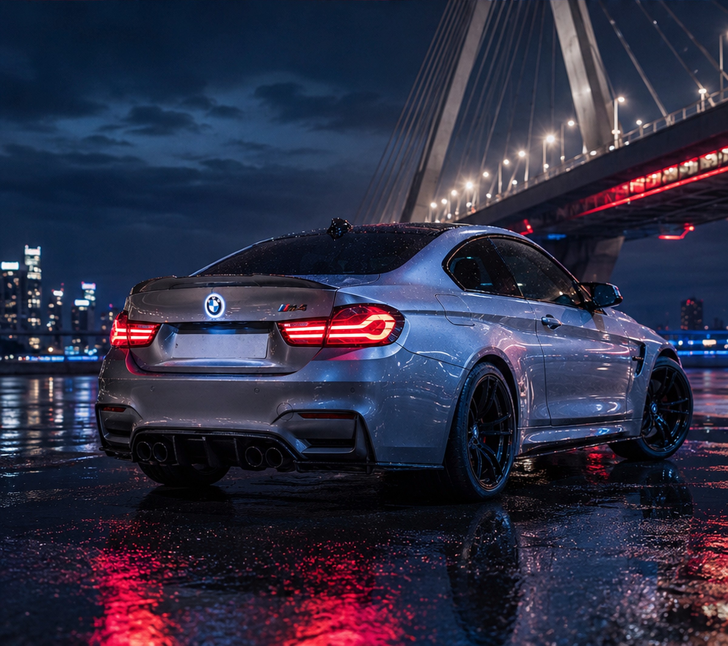 BMW M4 at night beneath a city bridge